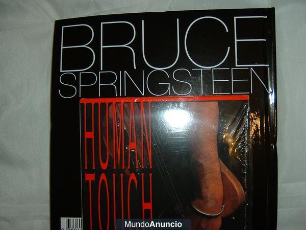 vendo cd+libro Human Touch de Bruce Springsteen