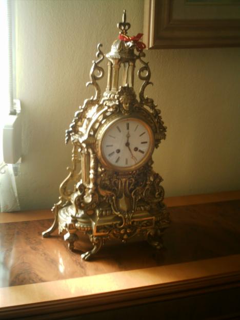 reloj de bronce