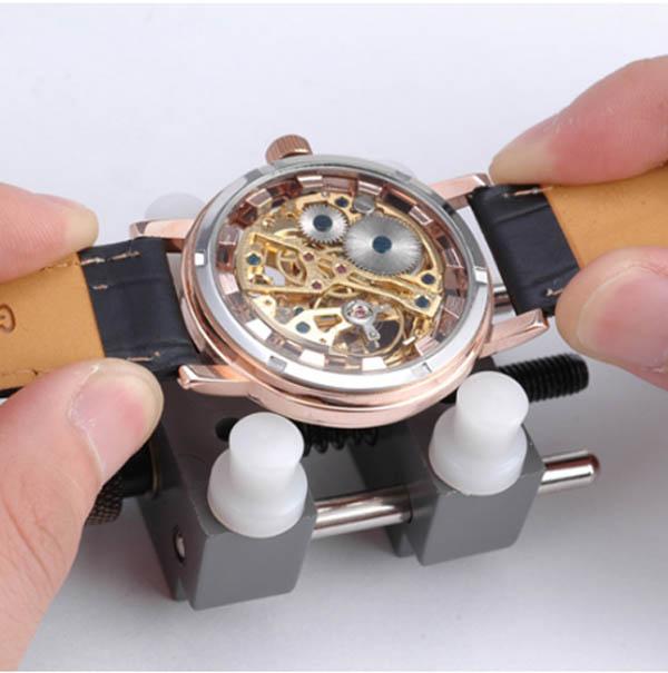 Herramienta relojero para sujetar reloj en reparacion