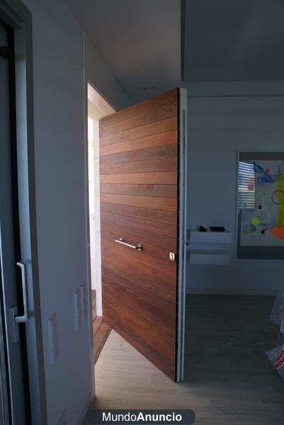 puertas exterior pivotantes eje desplazado