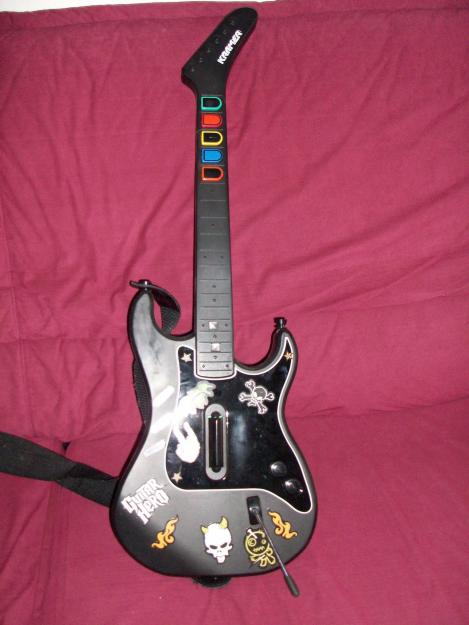 se vende guitar hero para play 2