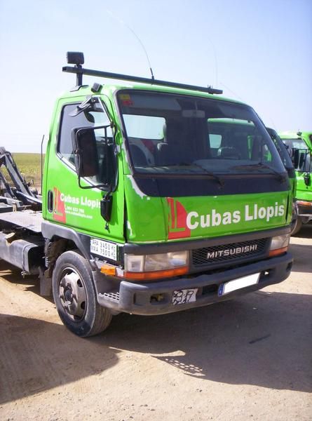 camion portacontenedor multibasculante para cubas