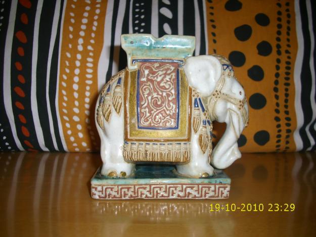 elefante  de ceramica y porcelana