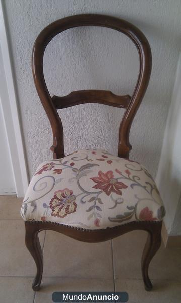 Silla estilo “Isabelina“ madera de nogal con patas “cabriolé”.