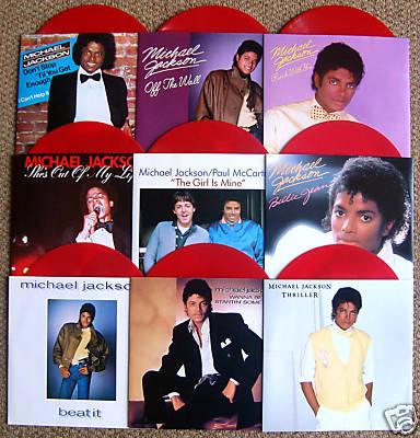 MICHAEL JACKSON. PACK 9 SINGLES VINILO ROJO EN FUNDA PVC ARTICULO DE 1983