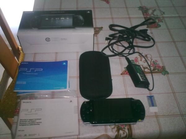 psp con 8 juegos y 6 peliculas