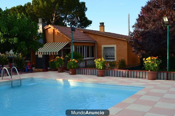 Vendo terreno con piscina y casa independiente