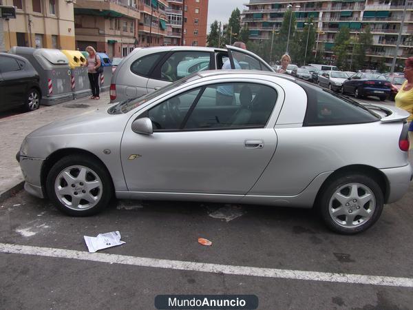 Vendo coche opel tigra deportivo en un buen estado color gris