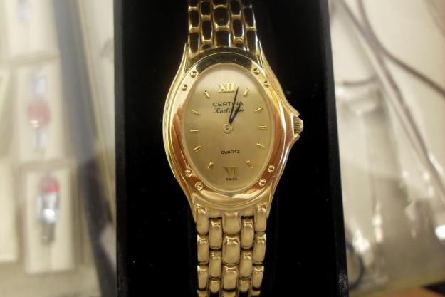 reloj de oro