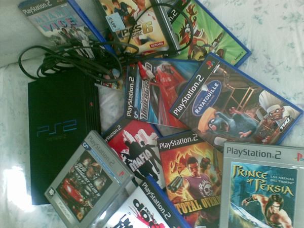 vendo ps2  con 14juegos, y  4 juegos de psp