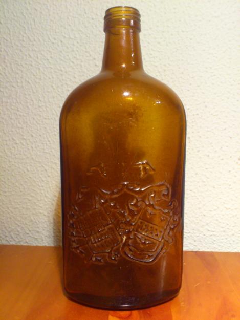 Botella LARIOS MÁLAGA Marrón. Muy antigua.Marca labrada en el propio cristal