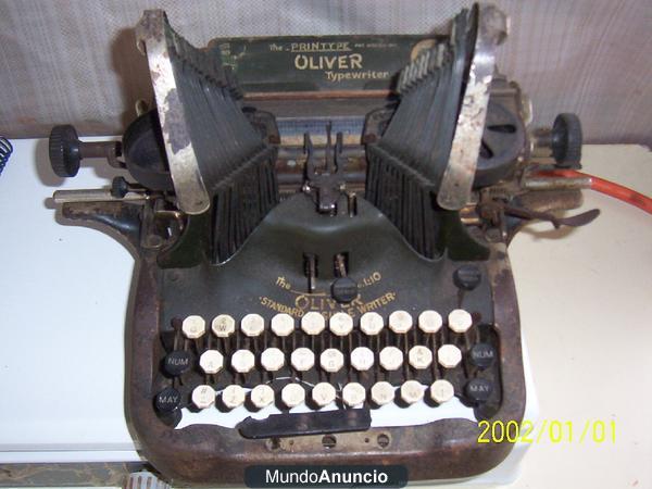maquina de escribir y calculadora antigüas
