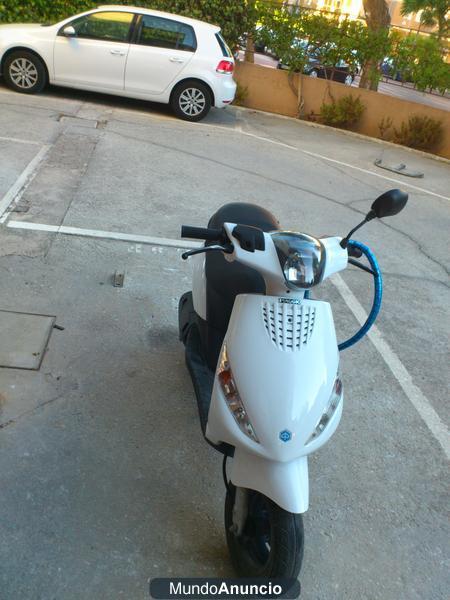 Moto zip blanca con garantia