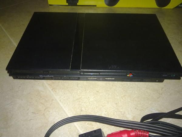 vendo ps2 slim chipeada