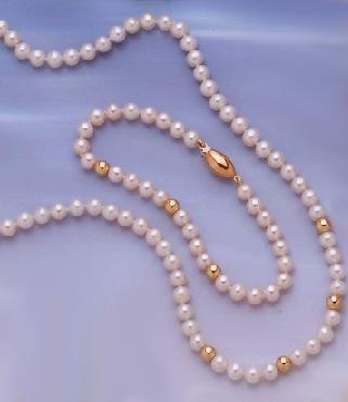 Gargantilla y pulsera perlas y oro Cristian Lay Zita