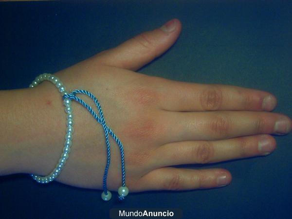Pulsera de perlas de cristal Nácar en hilo elástico y cordón.