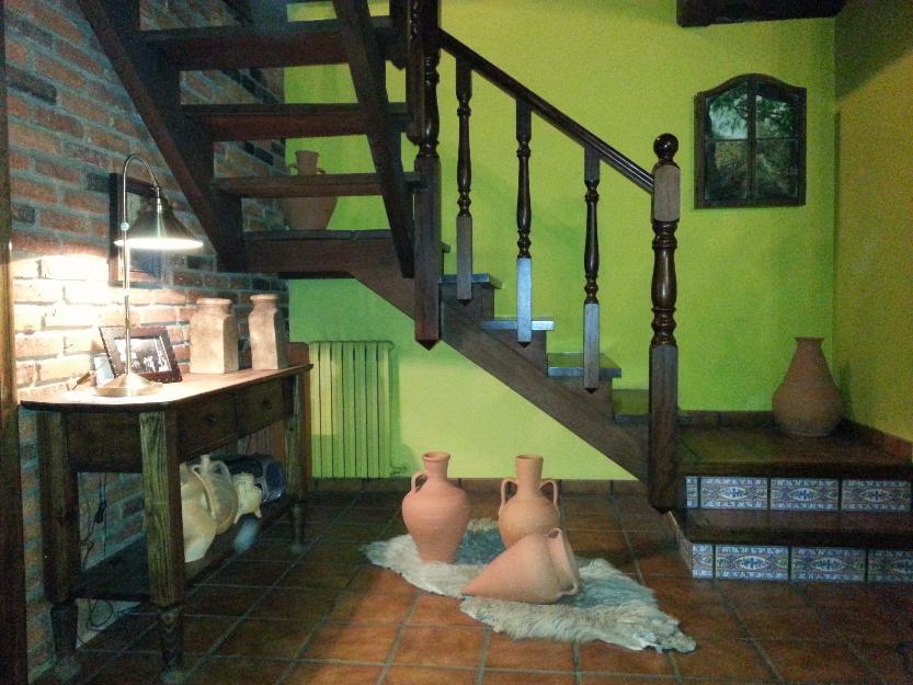 parcela con edificio adosado, totalmente restaurada y casa al lado con terreno privado