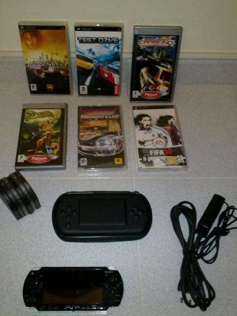 Vendo Psp Slim con 6 juegos originales