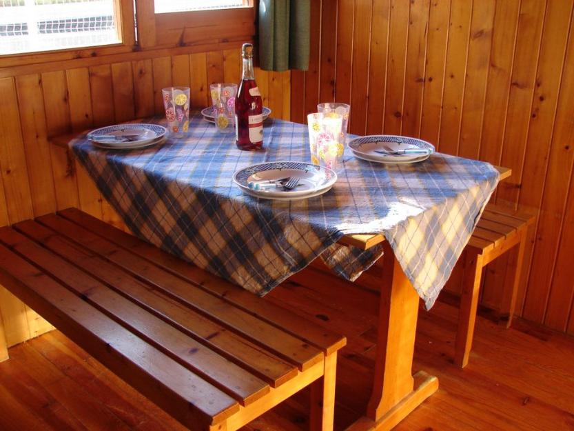 Casa de madera de ocasión transportable.