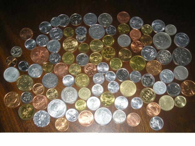 Lote,coleccion de 100 monedas mundiales,extranjeras diferentes .