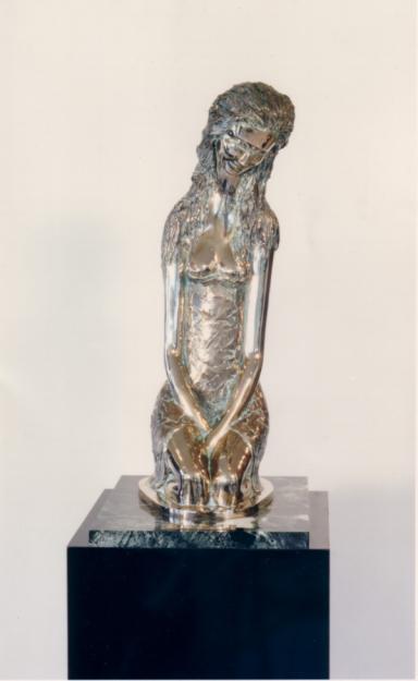 Escultura de bronce de Prince Monyo.