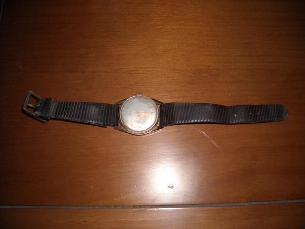 RELOJ TISSOT MANUAL A CUERDA