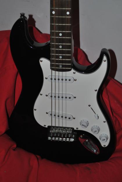 Guitarra electrica y ampli  50 €