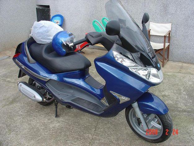 VENDO SCOOTER CON 3.300 KILOMETROS POR CAMBIO A SPORT