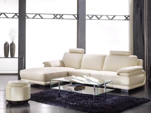 Impresionante sofá chaise longue tapizado en piel italiana