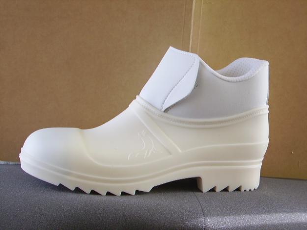 Zuecos blancos anti-grasa hasta el tobillo, Planas