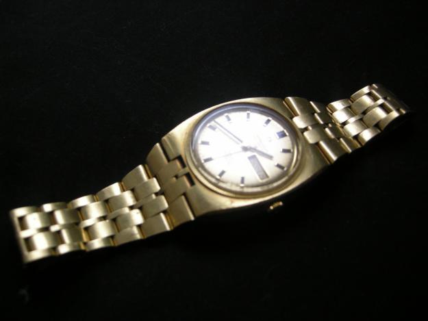 Reloj Omega Constellation caballero en oro.