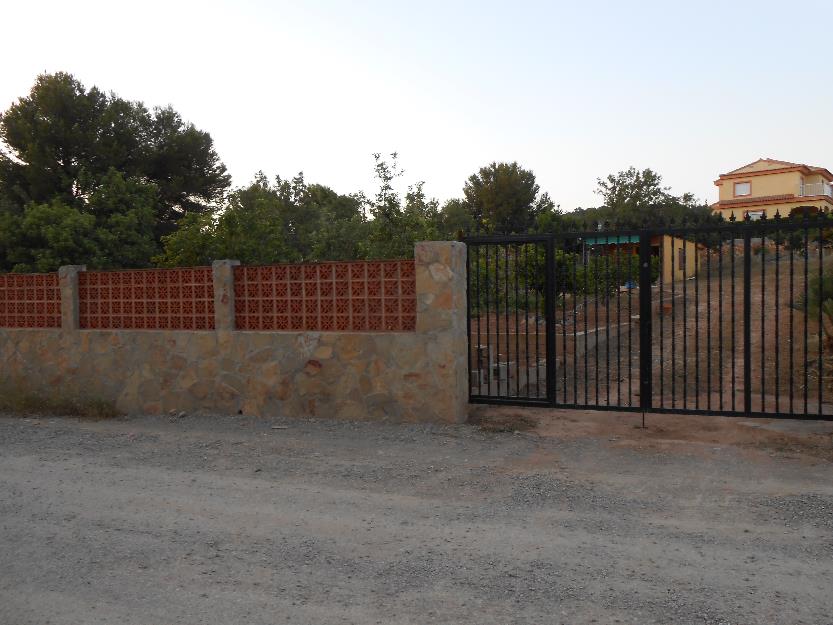 Parcela urbanizable con casa