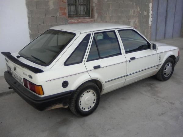 Cambio Ford Escort por moto 125.