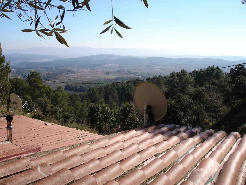 Terreno urbano con casa