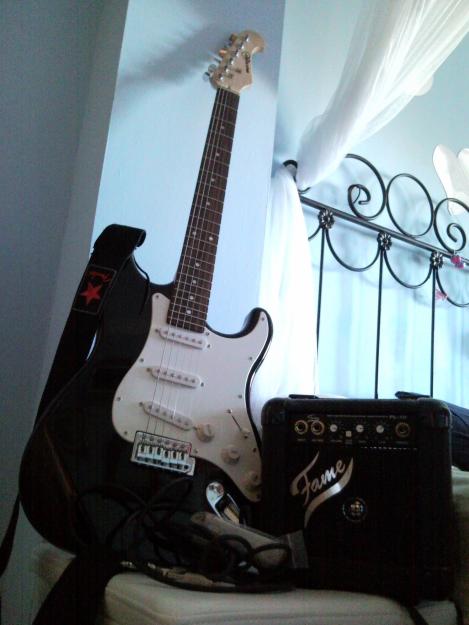 vendo guitarra electrica rockson+ampli fame