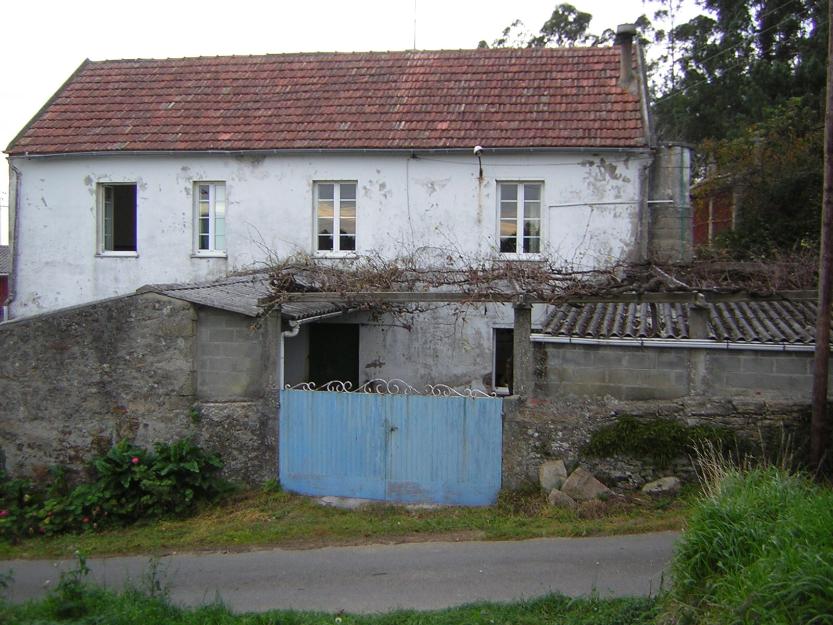 Casa de piedra y finca