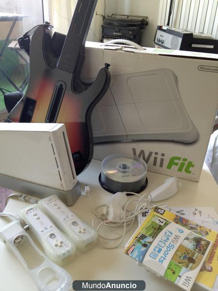 Wii chipeada con Balance Board, guitarra, +Extras