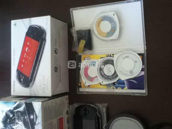 PSP + accesorios + juegos