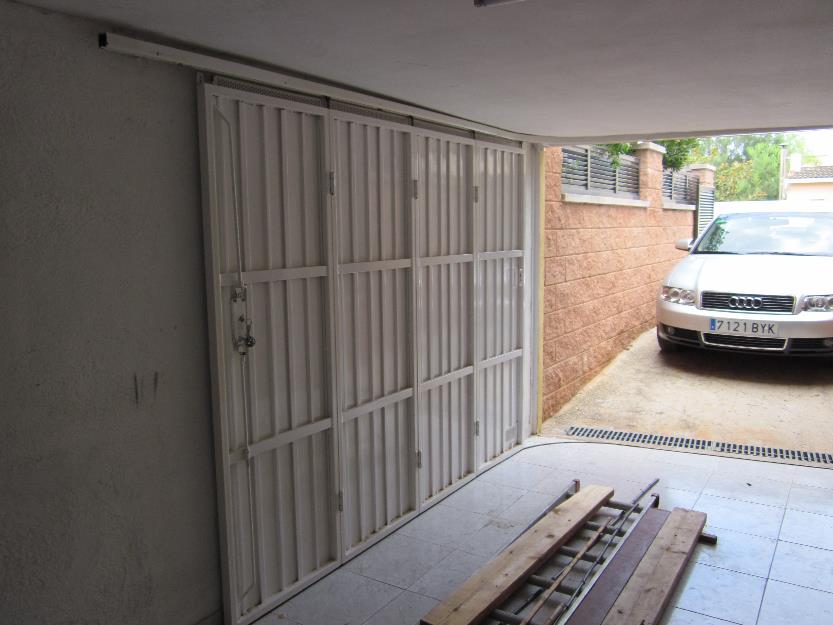 puerta corredera articulada