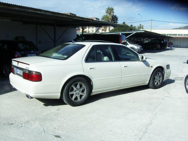 cuambio por furgoneta de asientos, por tener familla  mas numerosa este cadillac seville