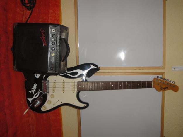 Vendo guitarra electrica sonora con amplificador