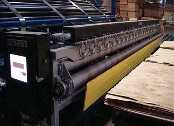 Medidor de humedad en linea para secaderos de chapa de madera.