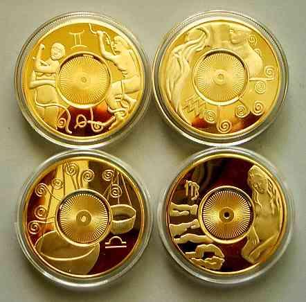 Monedas de oro y plata de tu signo