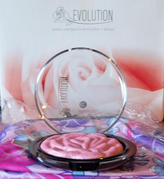 Set Polvo facial + monedero Evolution