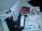Chollazo navideño!!   vendo wii blanca  con 4 mandos, 2 volantes y 1 juego - mejor precio | unprecio.es