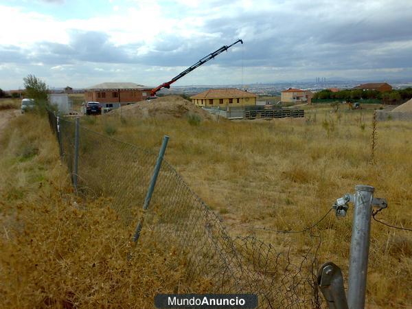 PARCELA 120O M2 CON CASA PREFABRICADA