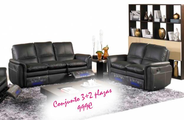 Conjunto sofás de piel con asientos relax. Color Negro