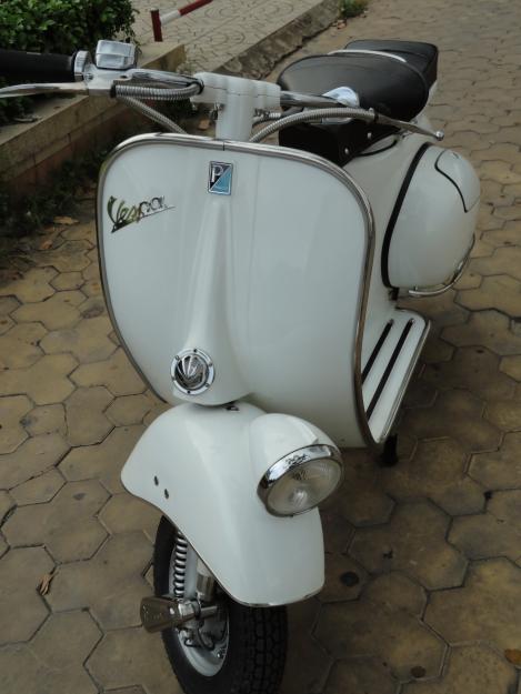 Vendo vespa faro bajo color blanca