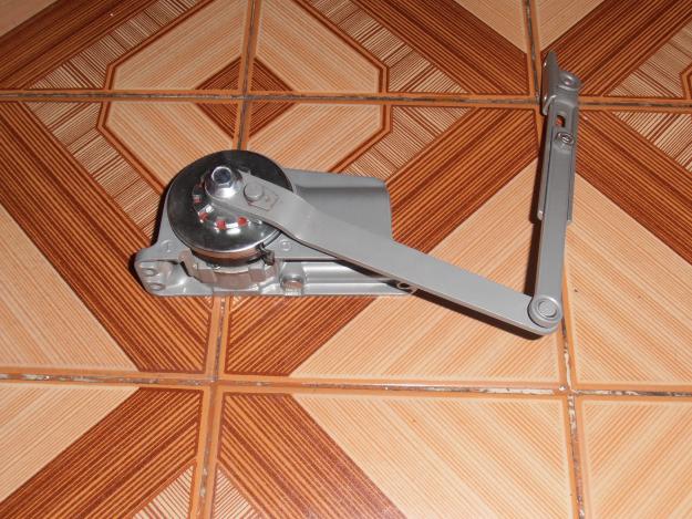 Retenedor de puertas hidraulico
