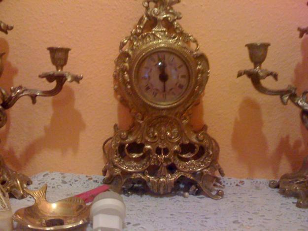 vendo reloj y candelabros